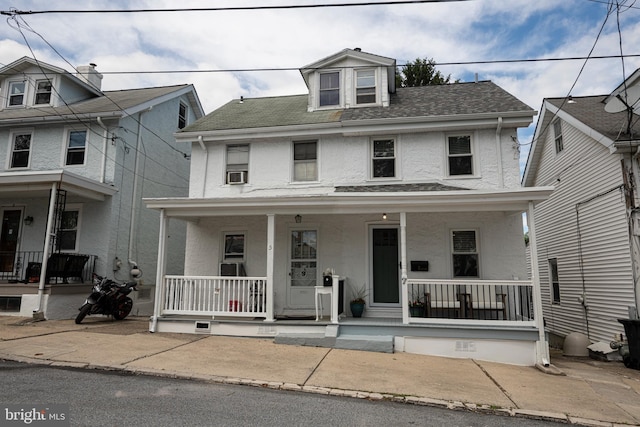 7 High St, Phoenixville, PA 19460 - american foursquare style home with covered porch, a shingled roof, and stucco siding