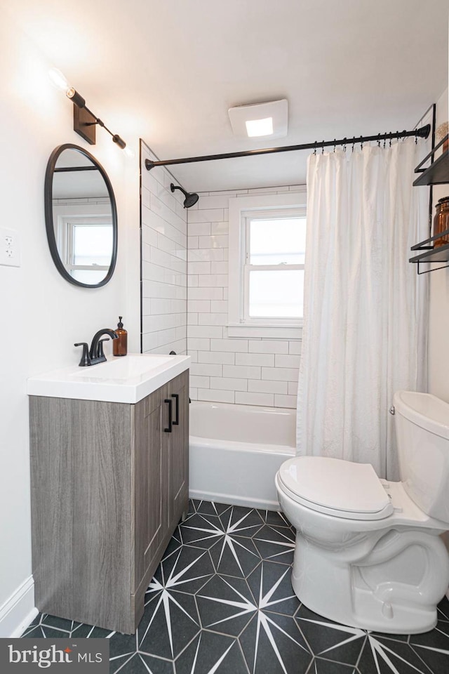 7 High St, Phoenixville, PA 19460 - full bathroom featuring toilet, vanity, shower / bathtub combination with curtain, and tile patterned floors