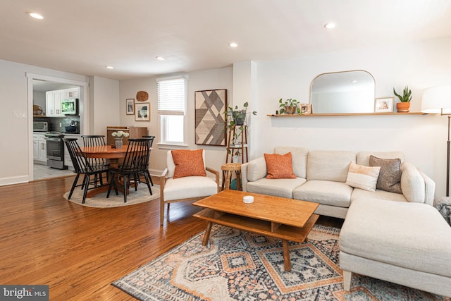 7 High St, Phoenixville, PA 19460 - living room featuring recessed lighting, wood finished floors, and baseboards