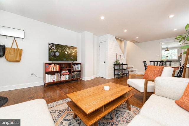 7 High St, Phoenixville, PA 19460 - living area featuring stairway, baseboards, wood finished floors, and recessed lighting