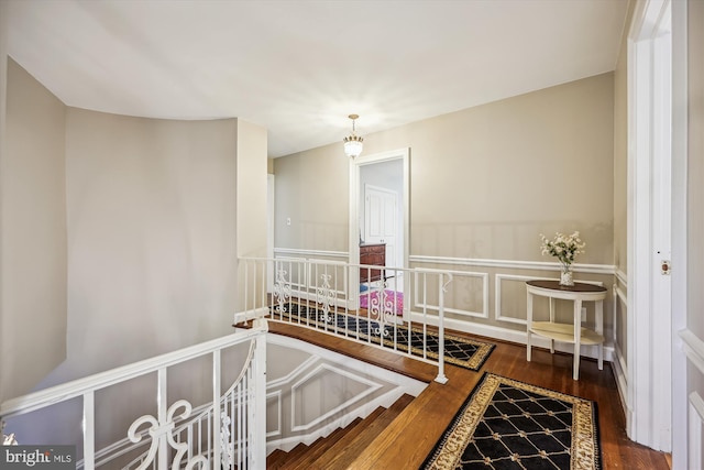 7600 Charleston Dr, Bethesda, MD 20817 - stairway with wood finished floors and wainscoting