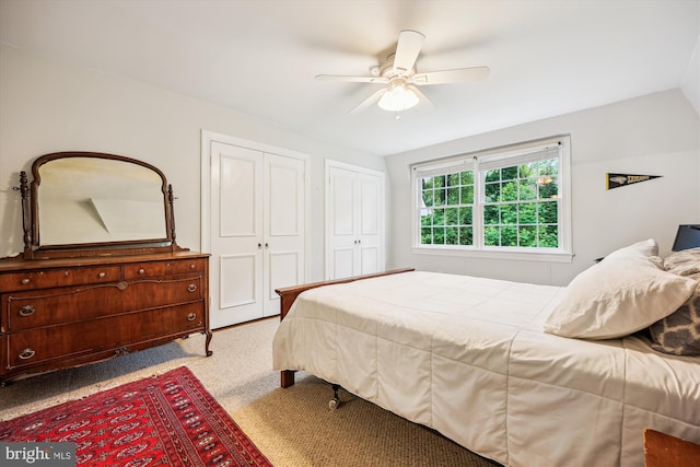7600 Charleston Dr, Bethesda, MD 20817 - bedroom with two closets, carpet, and a ceiling fan