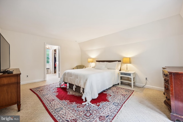 7600 Charleston Dr, Bethesda, MD 20817 - bedroom featuring light colored carpet and vaulted ceiling
