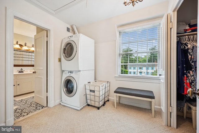 7600 Charleston Dr, Bethesda, MD 20817 - washroom featuring stacked washer / drying machine and carpet flooring