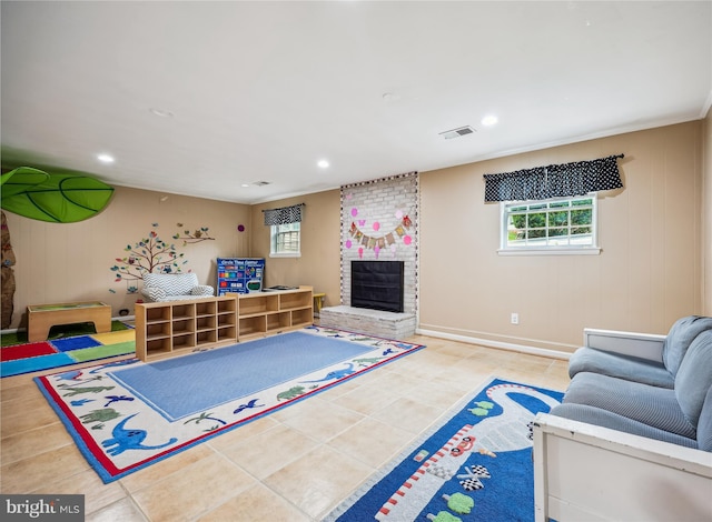 7600 Charleston Dr, Bethesda, MD 20817 - playroom featuring recessed lighting, a fireplace, and tile patterned flooring