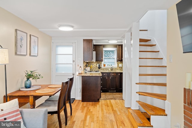 718 Addison St Unit B, Philadelphia, PA 19147 - dining space with stairway and light wood-style flooring
