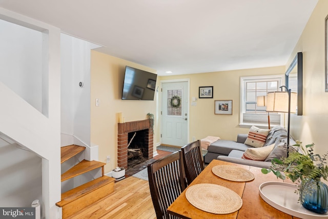 718 Addison St Unit B, Philadelphia, PA 19147 - living room with light wood-style flooring, a fireplace, and stairway