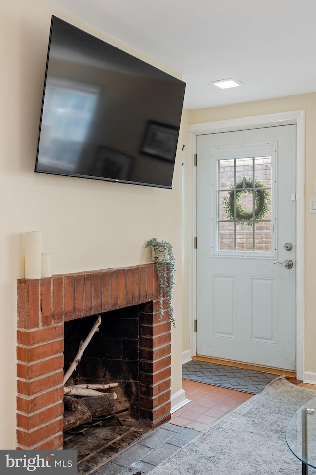 718 Addison St Unit B, Philadelphia, PA 19147 - entryway featuring a brick fireplace and baseboards