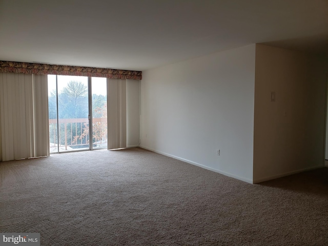 130 Slade Unit 511, Pikesville, MD 21208 - carpeted spare room with baseboards