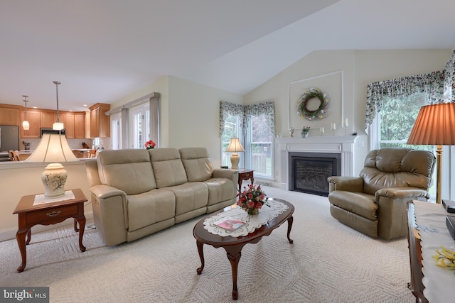 1350 Hyde Park Dr, Lancaster, PA 17601 - carpeted living area featuring plenty of natural light, a glass covered fireplace, and vaulted ceiling