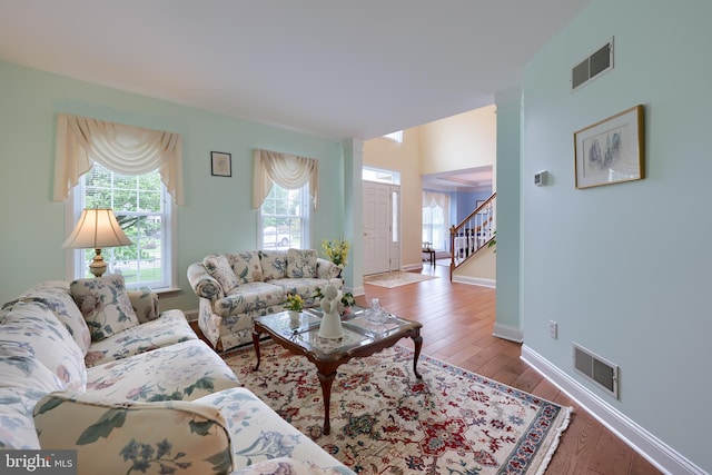 1350 Hyde Park Dr, Lancaster, PA 17601 - living room with wood-type flooring, stairway, and baseboards