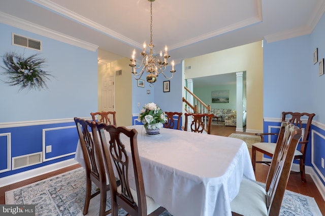 1350 Hyde Park Dr, Lancaster, PA 17601 - dining space with a chandelier, wood finished floors, crown molding, stairway, and baseboards