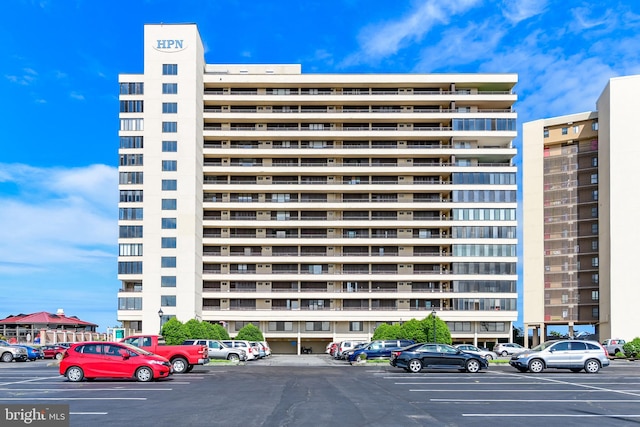 11400 Coastal Hwy Unit 8G, Ocean City, MD 21842 - view of apartment building / complex featuring uncovered parking