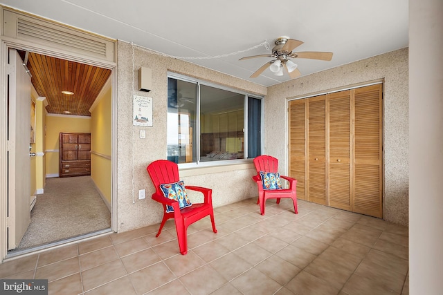 11400 Coastal Hwy Unit 8G, Ocean City, MD 21842 - sitting room with a ceiling fan and tile patterned flooring