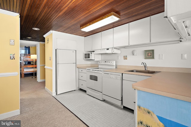 11400 Coastal Hwy Unit 8G, Ocean City, MD 21842 - kitchen with white appliances, a sink, wooden ceiling, light countertops, and under cabinet range hood