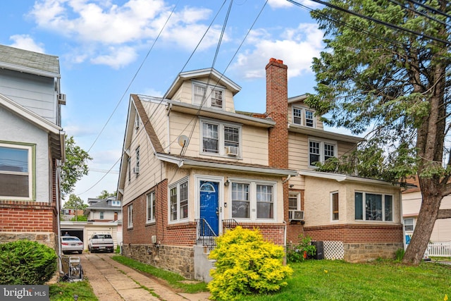 133 Reese St, Sharon Hill, PA 19079 - view of front of property with a chimney and a front yard