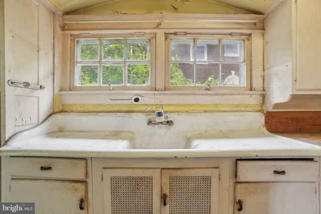 4100 Jenifer St NW, Washington, DC 20015 - kitchen featuring lofted ceiling and light countertops