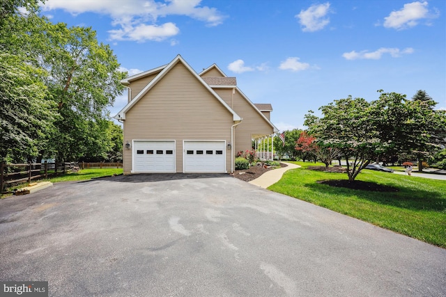 24830 Showbarn Cir, Damascus, MD 20872 - view of home's exterior featuring asphalt driveway and a garage