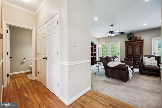 24830 Showbarn Cir, Damascus, MD 20872 - hallway featuring ornamental molding, baseboards, recessed lighting, and light wood-style floors