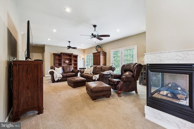 24830 Showbarn Cir, Damascus, MD 20872 - living area featuring light carpet, recessed lighting, ceiling fan, and a fireplace