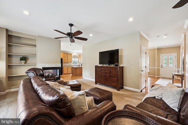 24830 Showbarn Cir, Damascus, MD 20872 - living area featuring a ceiling fan, light colored carpet, baseboards, recessed lighting, and a multi sided fireplace
