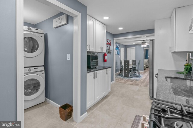 827 W 2nd St, Florence, NJ 08518 - washroom featuring stacked washer / dryer, a ceiling fan, baseboards, recessed lighting, and a sink