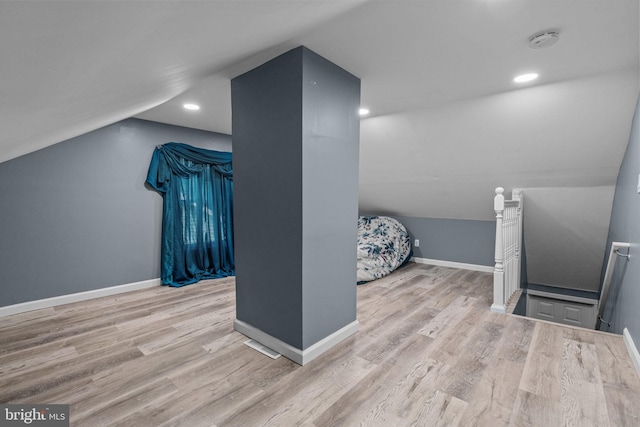 827 W 2nd St, Florence, NJ 08518 - additional living space featuring lofted ceiling, wood finished floors, baseboards, and recessed lighting