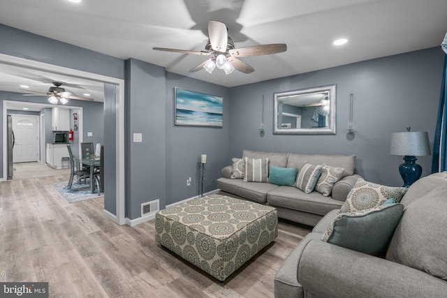 827 W 2nd St, Florence, NJ 08518 - living area with a ceiling fan, recessed lighting, light wood finished floors, and baseboards