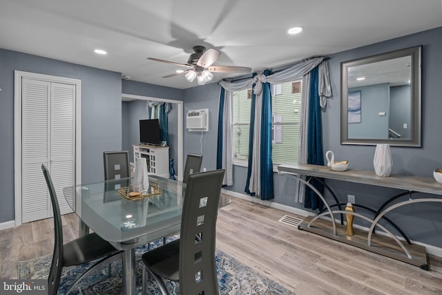 827 W 2nd St, Florence, NJ 08518 - dining area with baseboards, an AC wall unit, wood finished floors, a ceiling fan, and recessed lighting