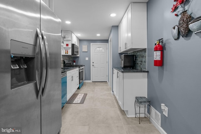 827 W 2nd St, Florence, NJ 08518 - kitchen featuring appliances with stainless steel finishes, recessed lighting, tasteful backsplash, white cabinets, and baseboards