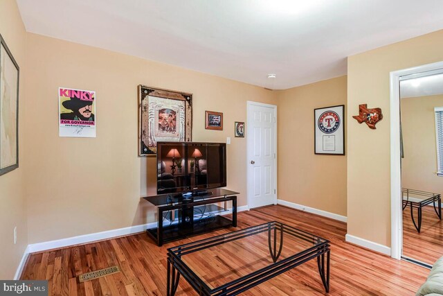 4406 Roundhill Rd, Alexandria, VA 22310 - living room featuring wood finished floors and baseboards