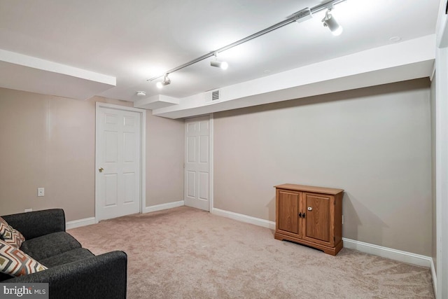 4406 Roundhill Rd, Alexandria, VA 22310 - living area with track lighting, light carpet, and baseboards