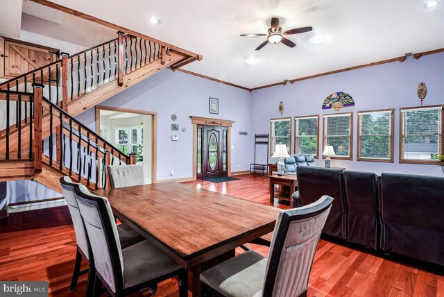 4406 Roundhill Rd, Alexandria, VA 22310 - dining room with a ceiling fan, stairway, wood finished floors, crown molding, and a high ceiling