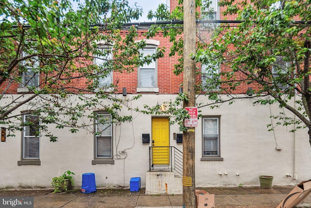 909 S 20th St Unit 3, Philadelphia, PA 19146 - view of front of property featuring stucco siding and brick siding