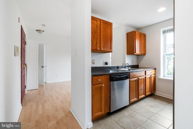 909 S 20th St Unit 3, Philadelphia, PA 19146 - kitchen featuring dishwasher, a sink, dark countertops, brown cabinetry, and recessed lighting