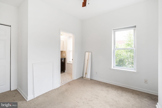 909 S 20th St Unit 3, Philadelphia, PA 19146 - unfurnished bedroom featuring light carpet, connected bathroom, and baseboards