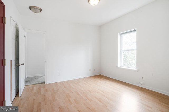 909 S 20th St Unit 3, Philadelphia, PA 19146 - unfurnished room with healthy amount of natural light, light wood-style floors, and baseboards