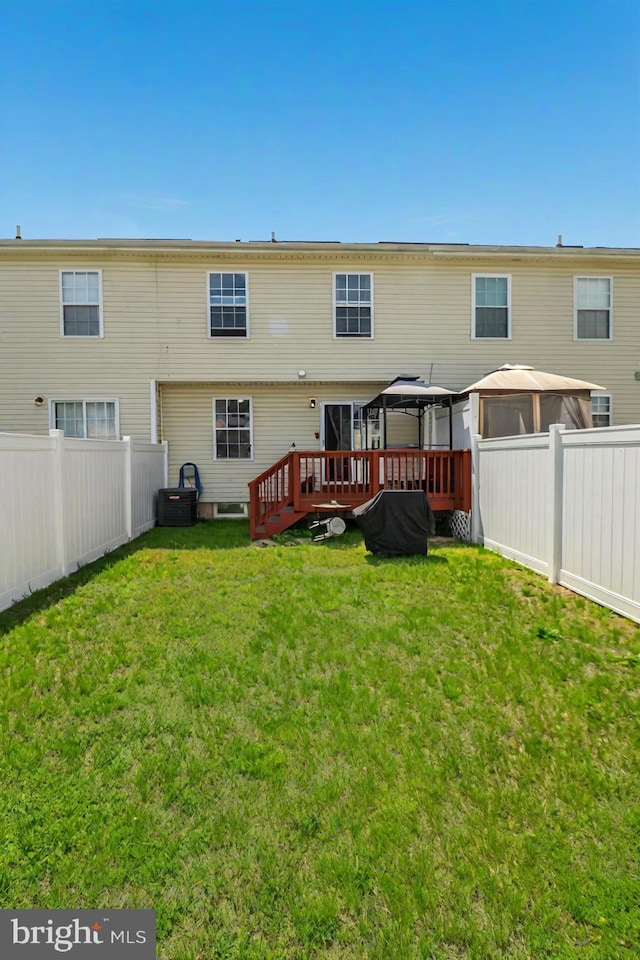 386 Braddock Rd, Smyrna, DE 19977 - back of property featuring a gazebo, a deck, and central AC unit