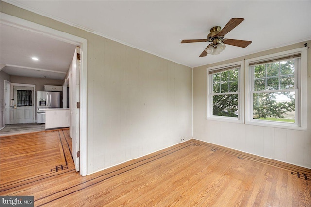 344 Clearbrook Ave, Lansdowne, PA 19050 - spare room featuring light wood-style floors, ceiling fan, baseboards, and crown molding