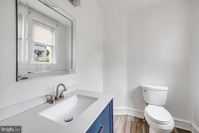 344 Clearbrook Ave, Lansdowne, PA 19050 - bathroom featuring toilet, vanity, baseboards, and wood finished floors