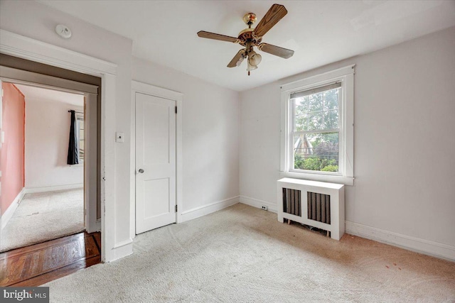 344 Clearbrook Ave, Lansdowne, PA 19050 - carpeted empty room with radiator, baseboards, ceiling fan, and a smoke detector