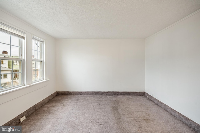 4749 Marple St, Philadelphia, PA 19136 - carpeted spare room with a textured ceiling and baseboards