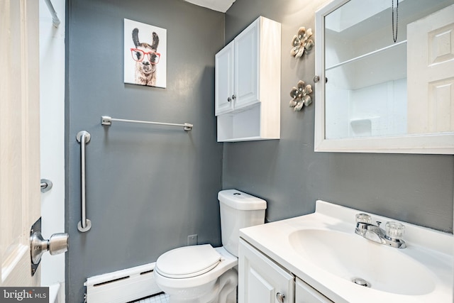4749 Marple St, Philadelphia, PA 19136 - bathroom with baseboard heating, toilet, vanity, and a shower