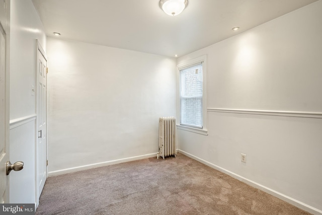 4749 Marple St, Philadelphia, PA 19136 - empty room featuring radiator heating unit, carpet flooring, baseboards, and recessed lighting