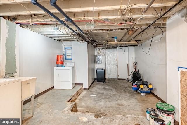 4749 Marple St, Philadelphia, PA 19136 - unfinished basement featuring washer / clothes dryer and baseboards