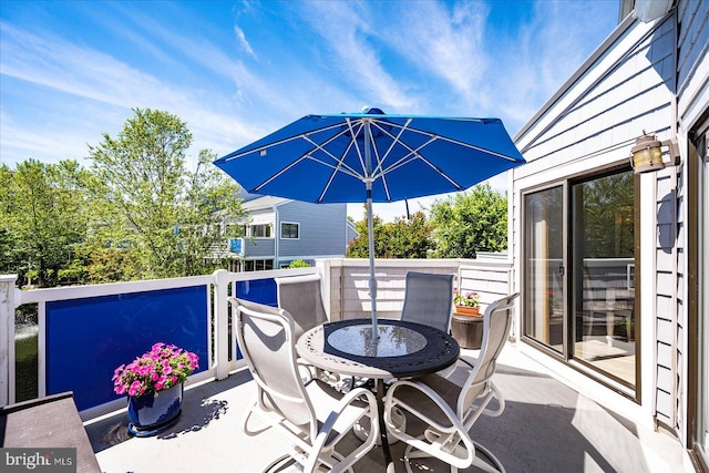 39724 E Sun Dr Unit 226, Fenwick Island, DE 19944 - view of patio / terrace with outdoor dining area