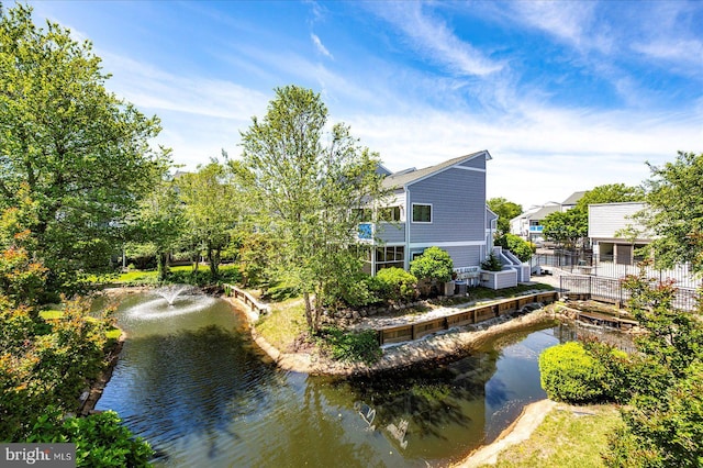 39724 E Sun Dr Unit 226, Fenwick Island, DE 19944 - rear view of property featuring a water view
