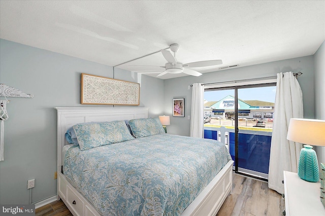 39724 E Sun Dr Unit 226, Fenwick Island, DE 19944 - bedroom featuring wood finished floors and ceiling fan