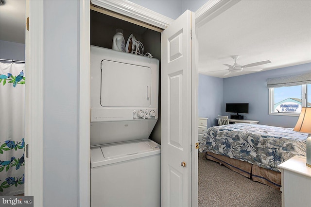 39724 E Sun Dr Unit 226, Fenwick Island, DE 19944 - washroom with stacked washer / drying machine and a ceiling fan