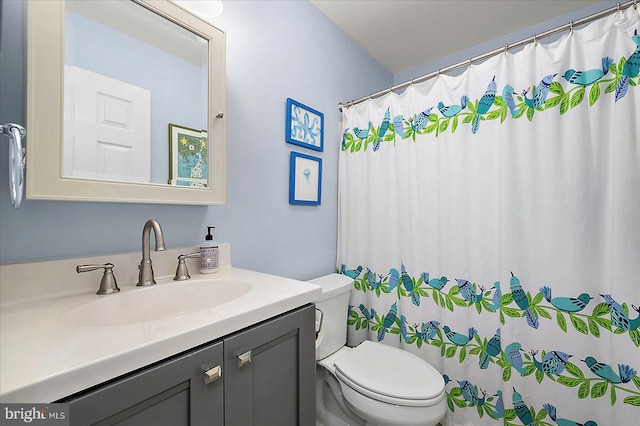 39724 E Sun Dr Unit 226, Fenwick Island, DE 19944 - full bathroom with toilet, vanity, and a shower with shower curtain